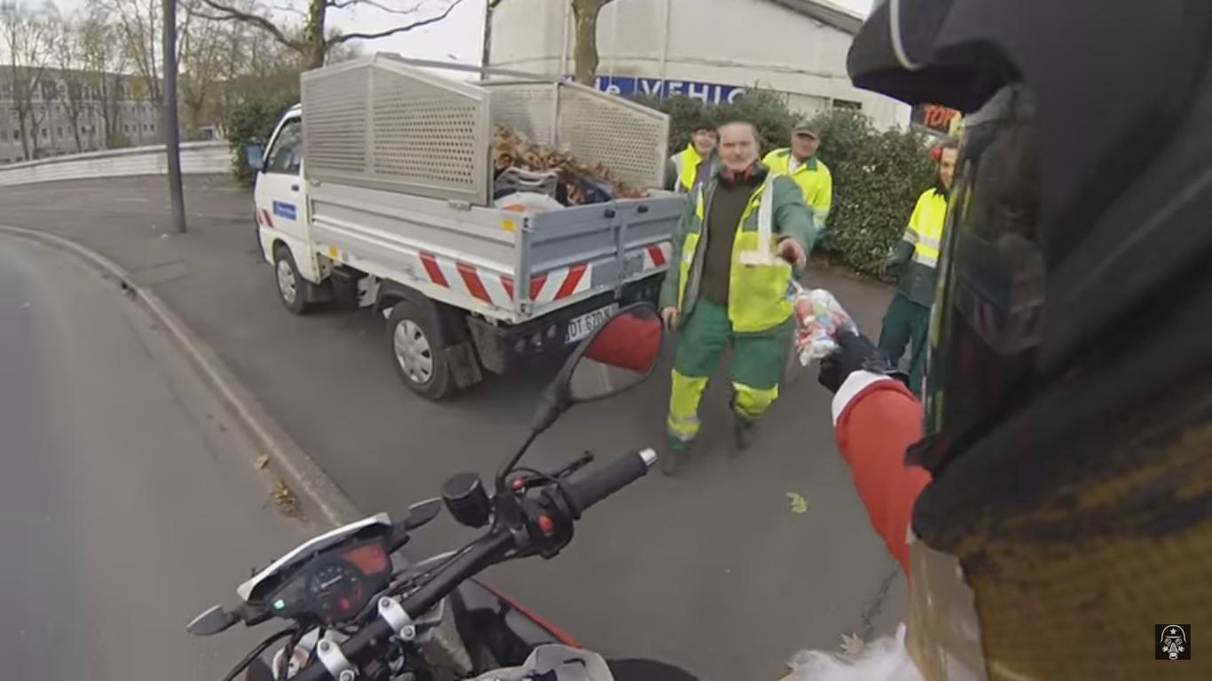 Biker Gives Away Christmas Gifts on the Road