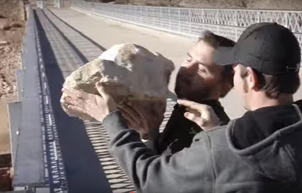 They Drop a Huge Rock off a Bridge into the Water