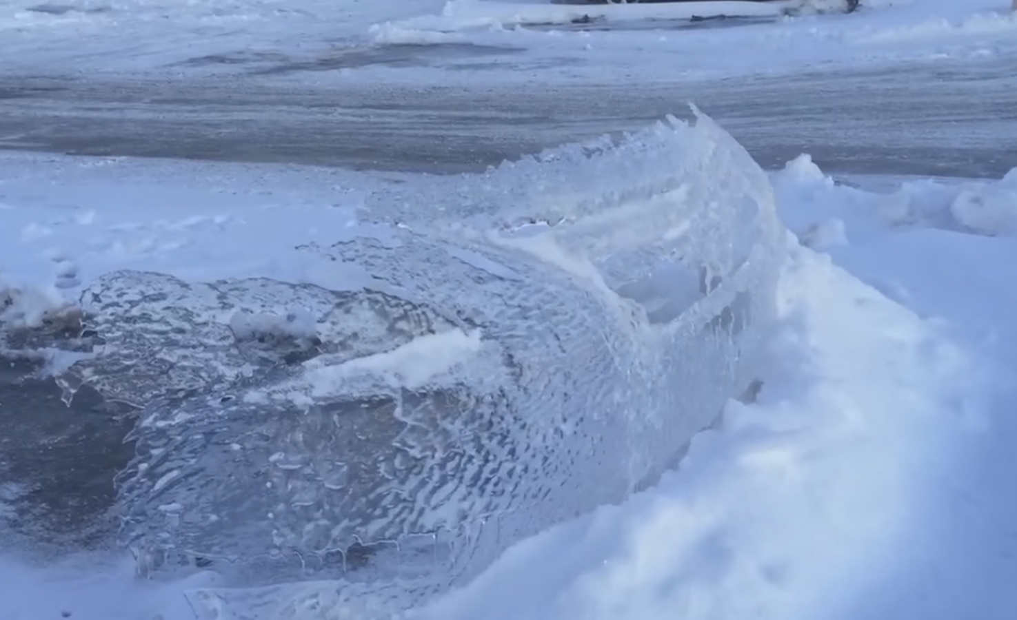 This Car Left an Ice Imprint When Getting out of its Parking Spot