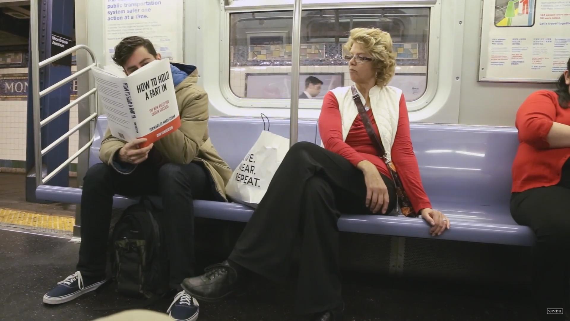 Reading Books With Hilarious Fake Covers on the Subway