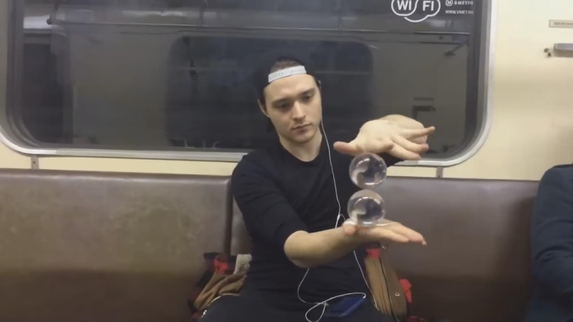 Look at What This Man Can Do With His Balls in a Moving Train
