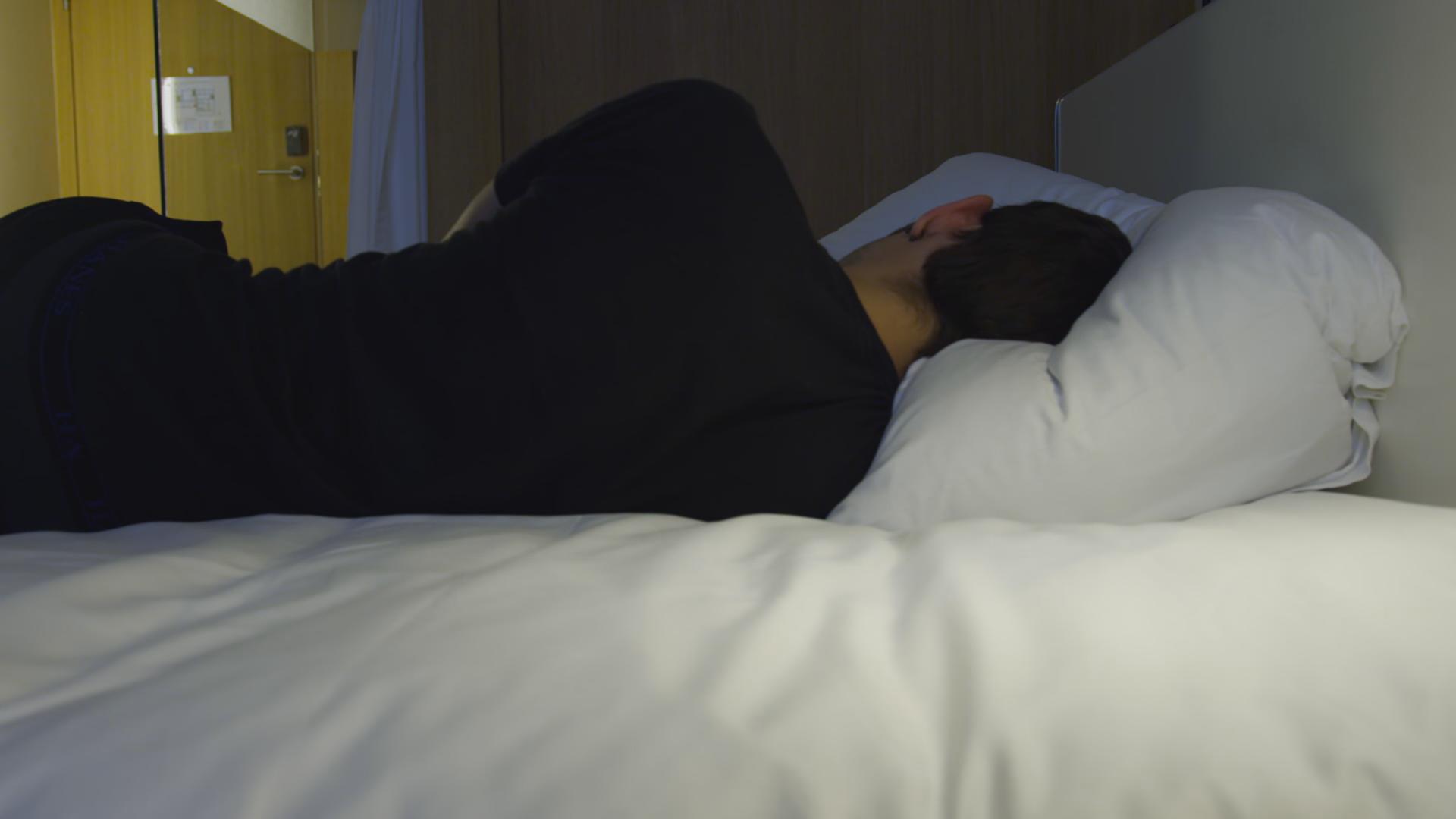One Hour 4K Footage of a Guy Sleeping in a Hotel